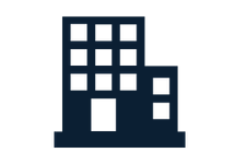 Silhouette of a multi-story building or office building against a black background.