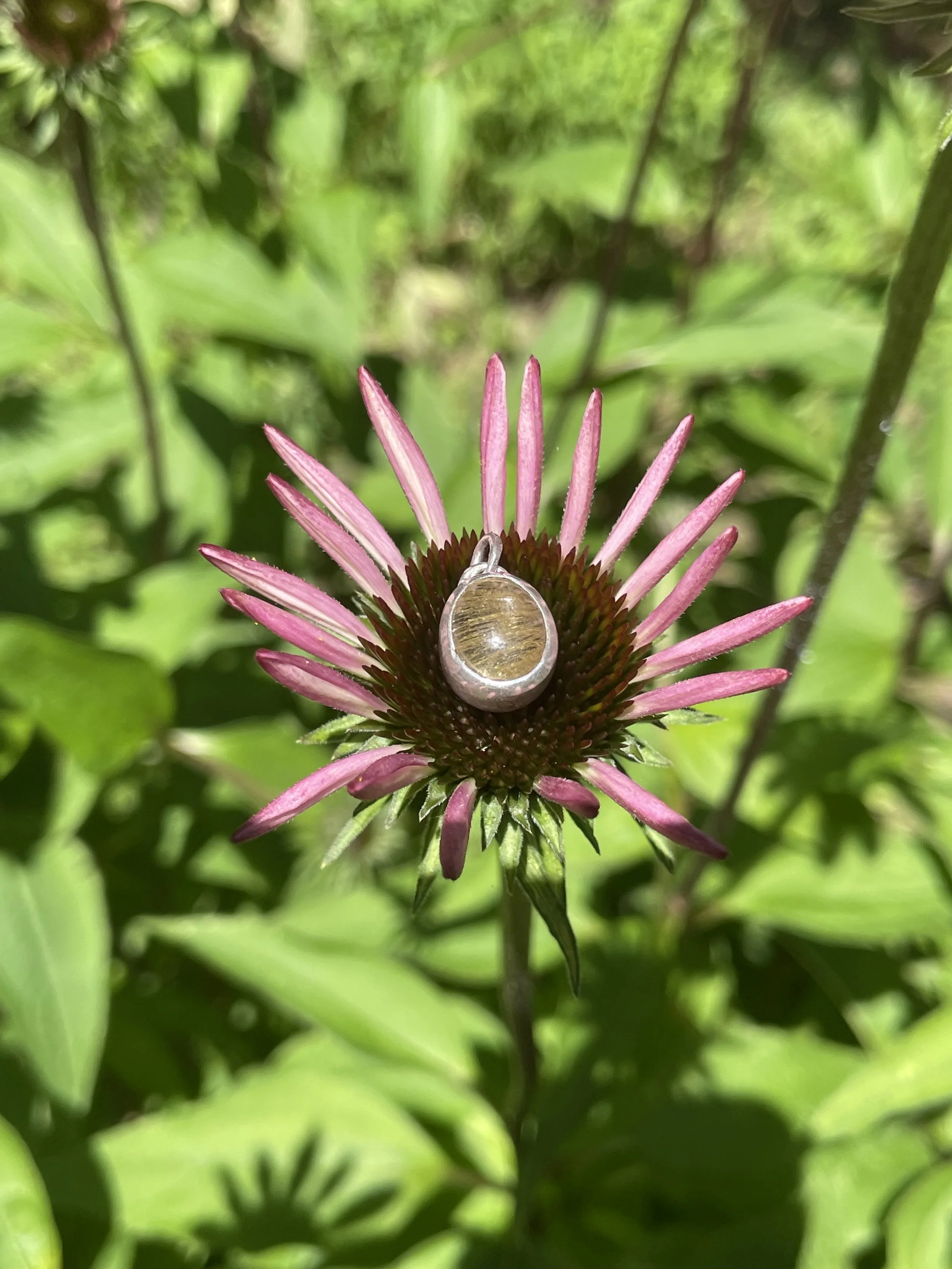 sterling silver step bezel, rutilated quartz cabochon