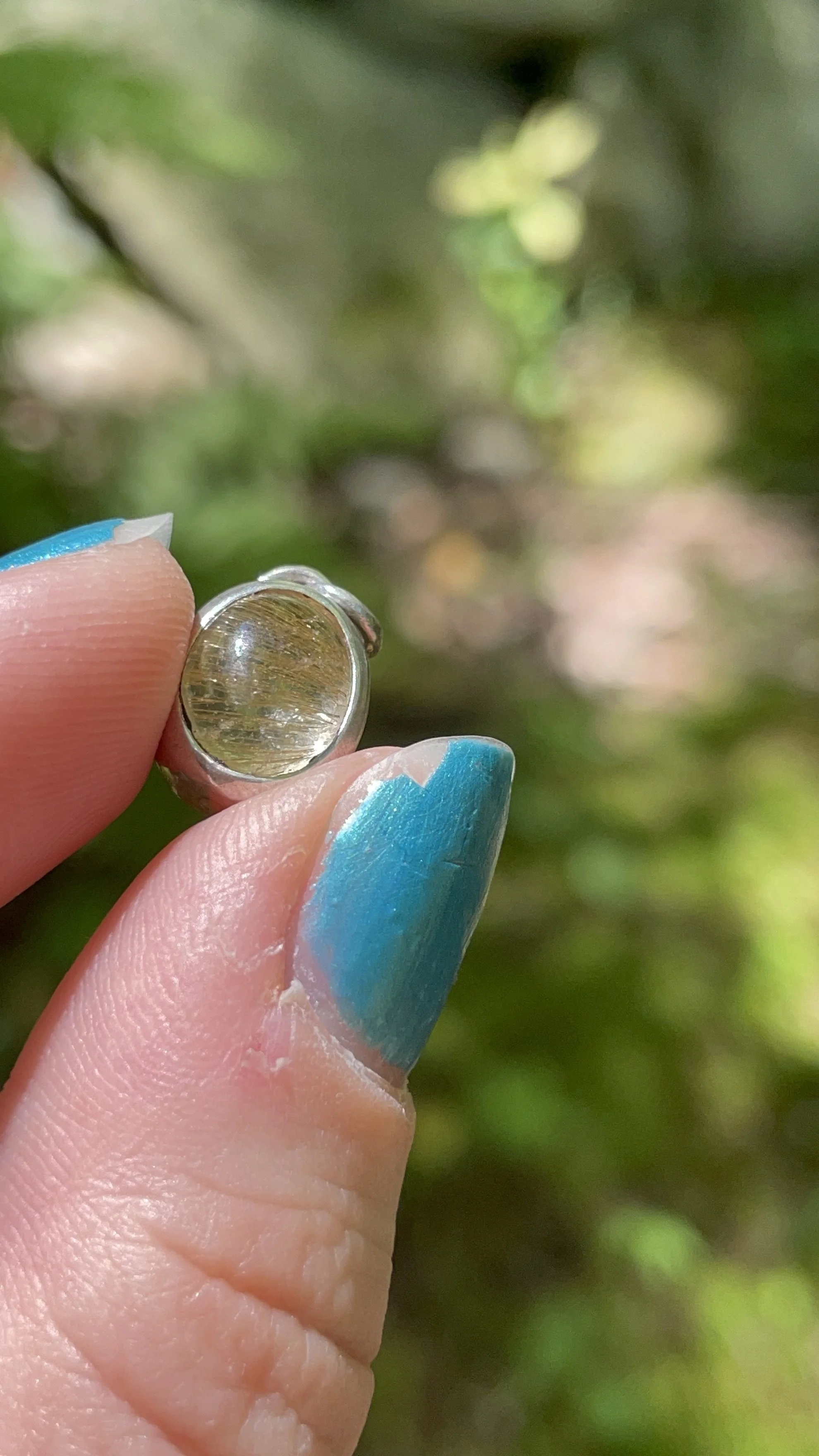 sterling silver step bezel, rutilated quartz cabochon