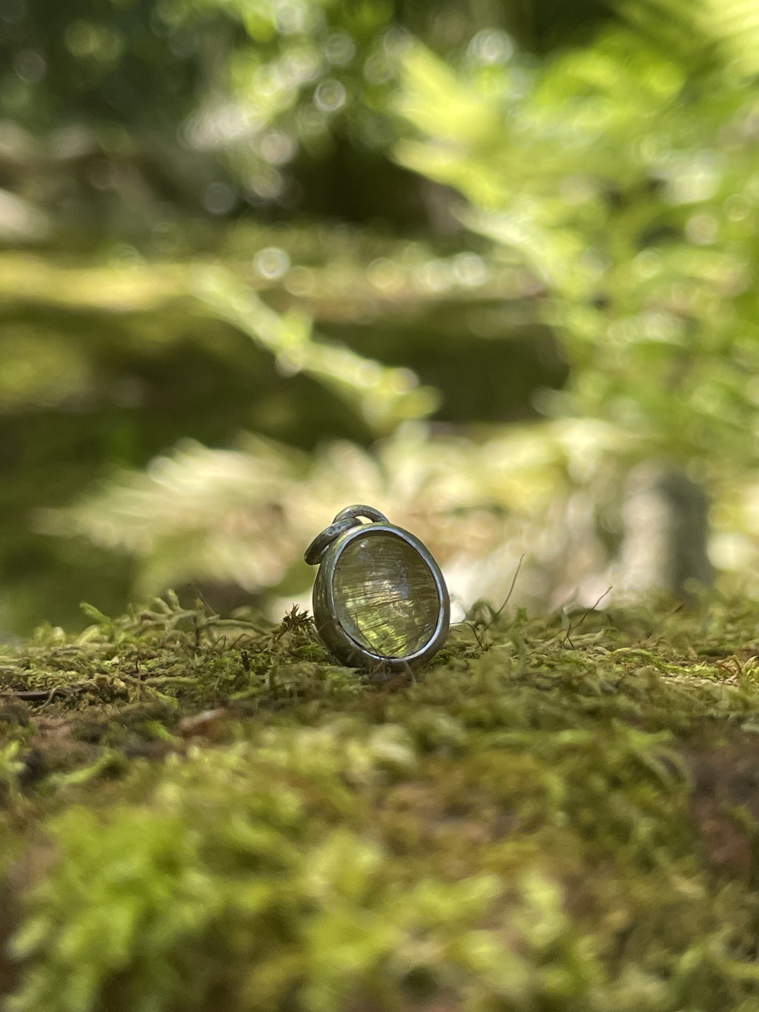 sterling silver step bezel, rutilated quartz cabochon