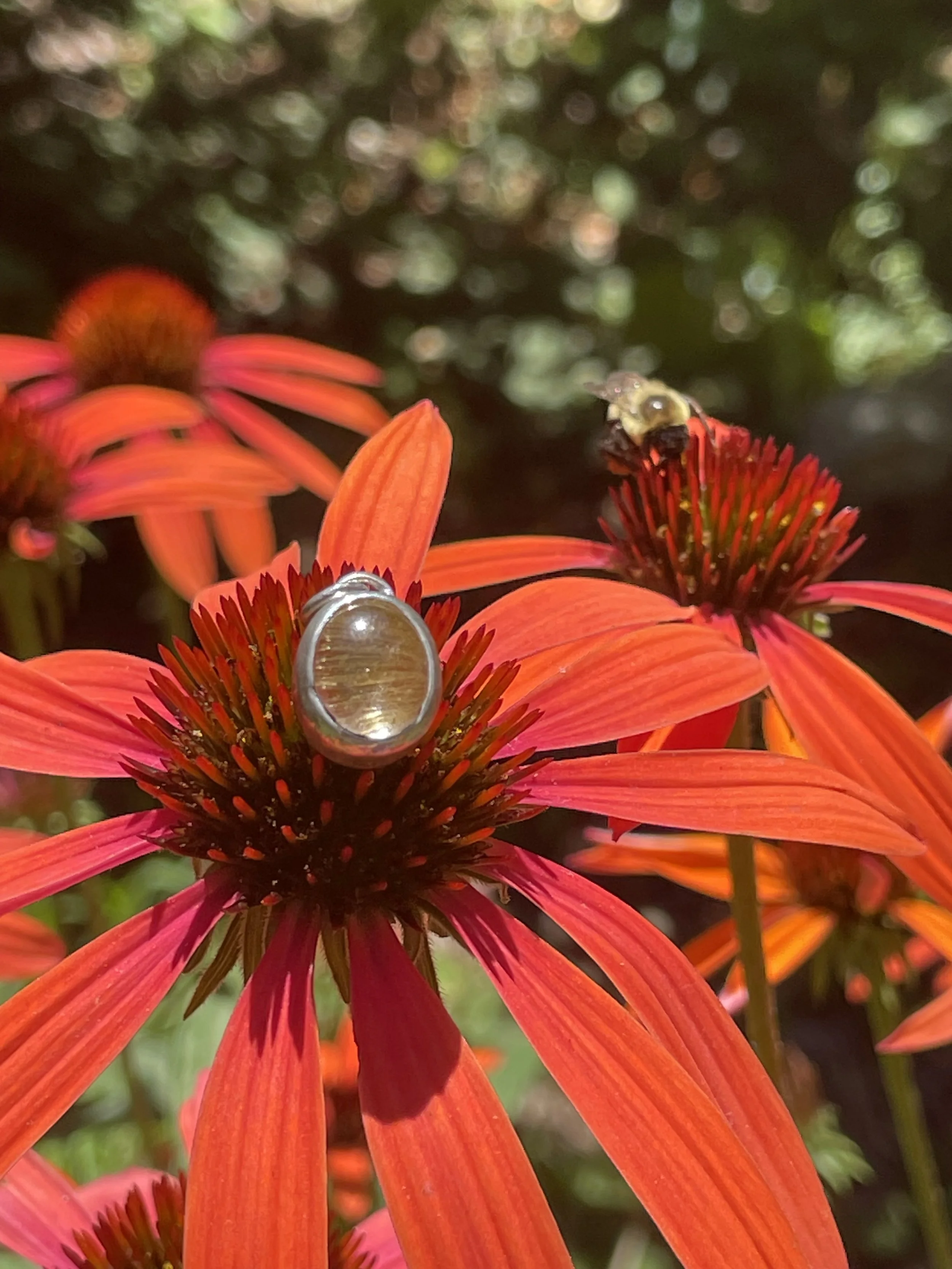 sterling silver step bezel, rutilated quartz cabochon