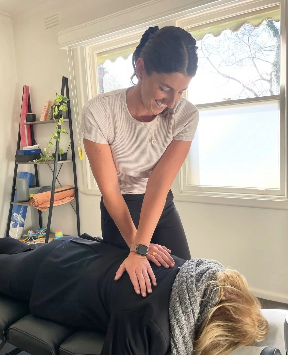 Dr Felicity Warren providing chiropractic treatment to a female patient at her South Gippsland practice.