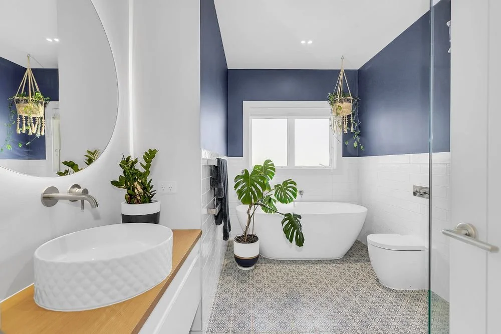 bathroom-renovation-freestanding-bath-toilet-vanity-sink-shower-navy-white