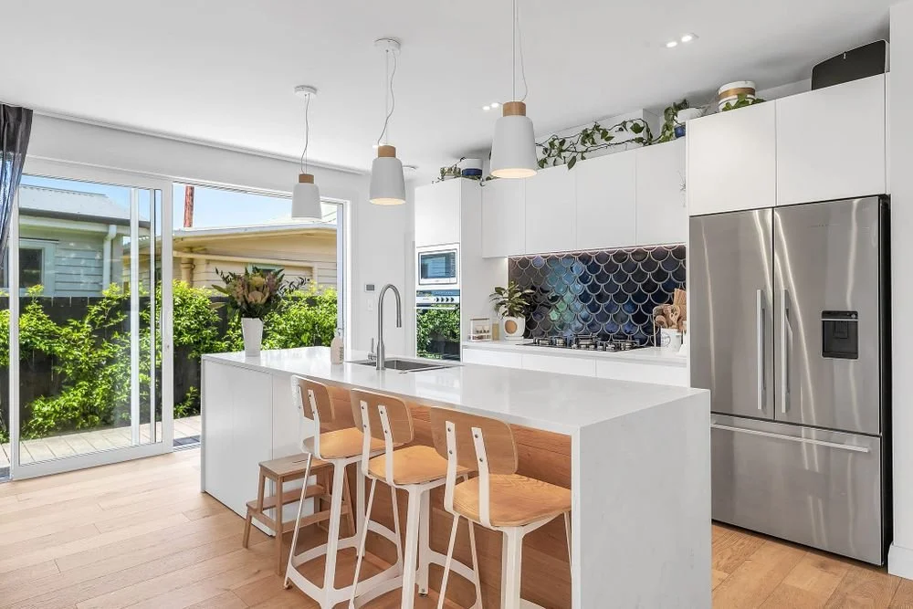 Modern new build kitchen with island bench and seating all new plumbing