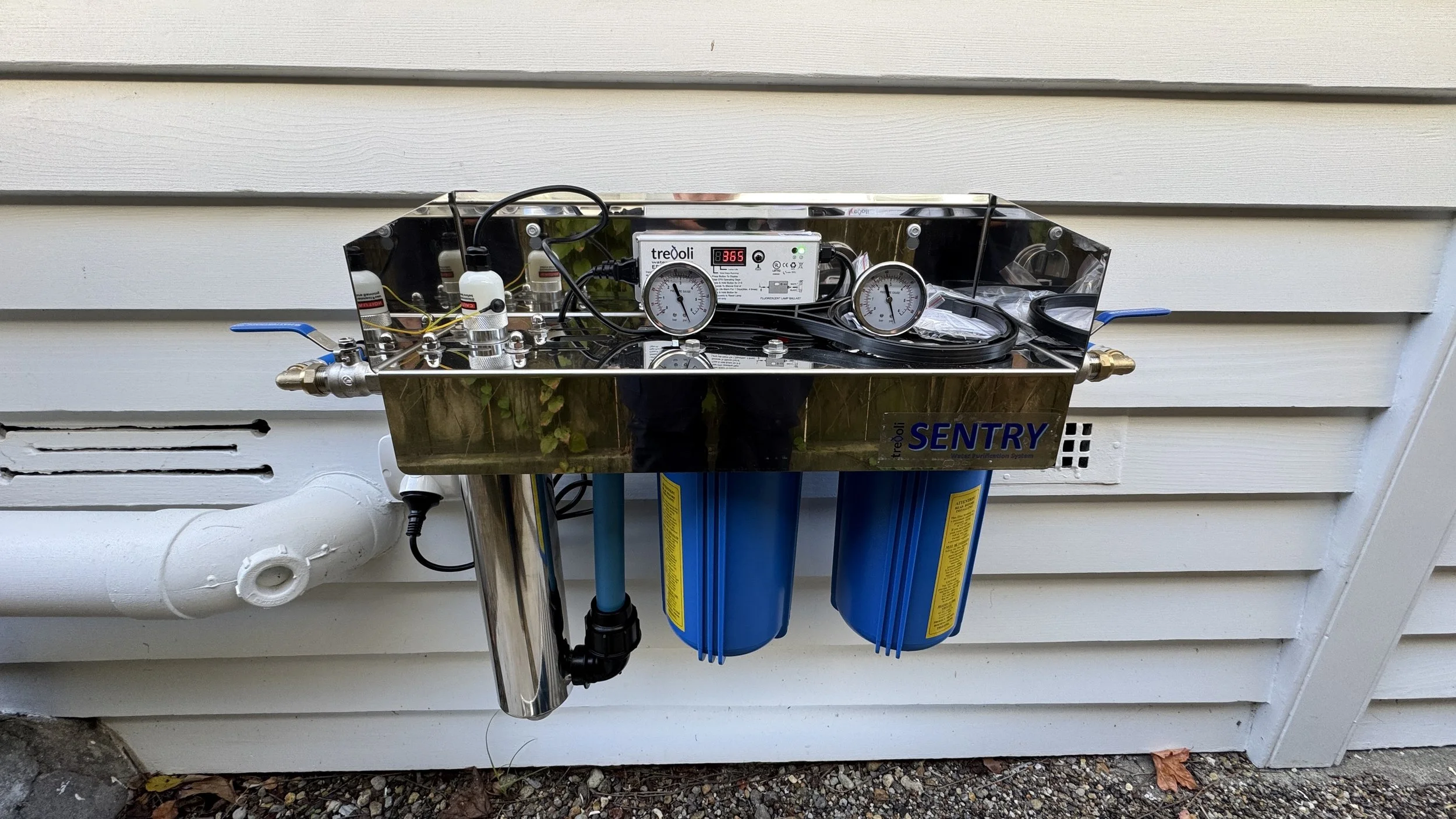 exterior-house-water-filter-system-installed