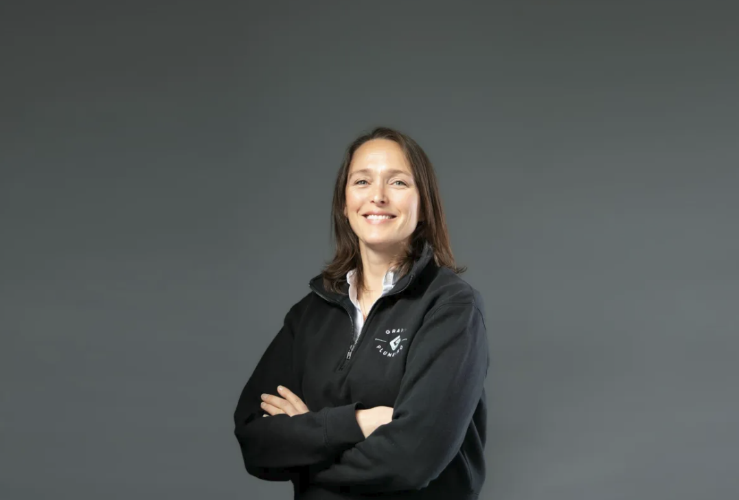 Portrait-office-marketing-manager-gravity-plumbing