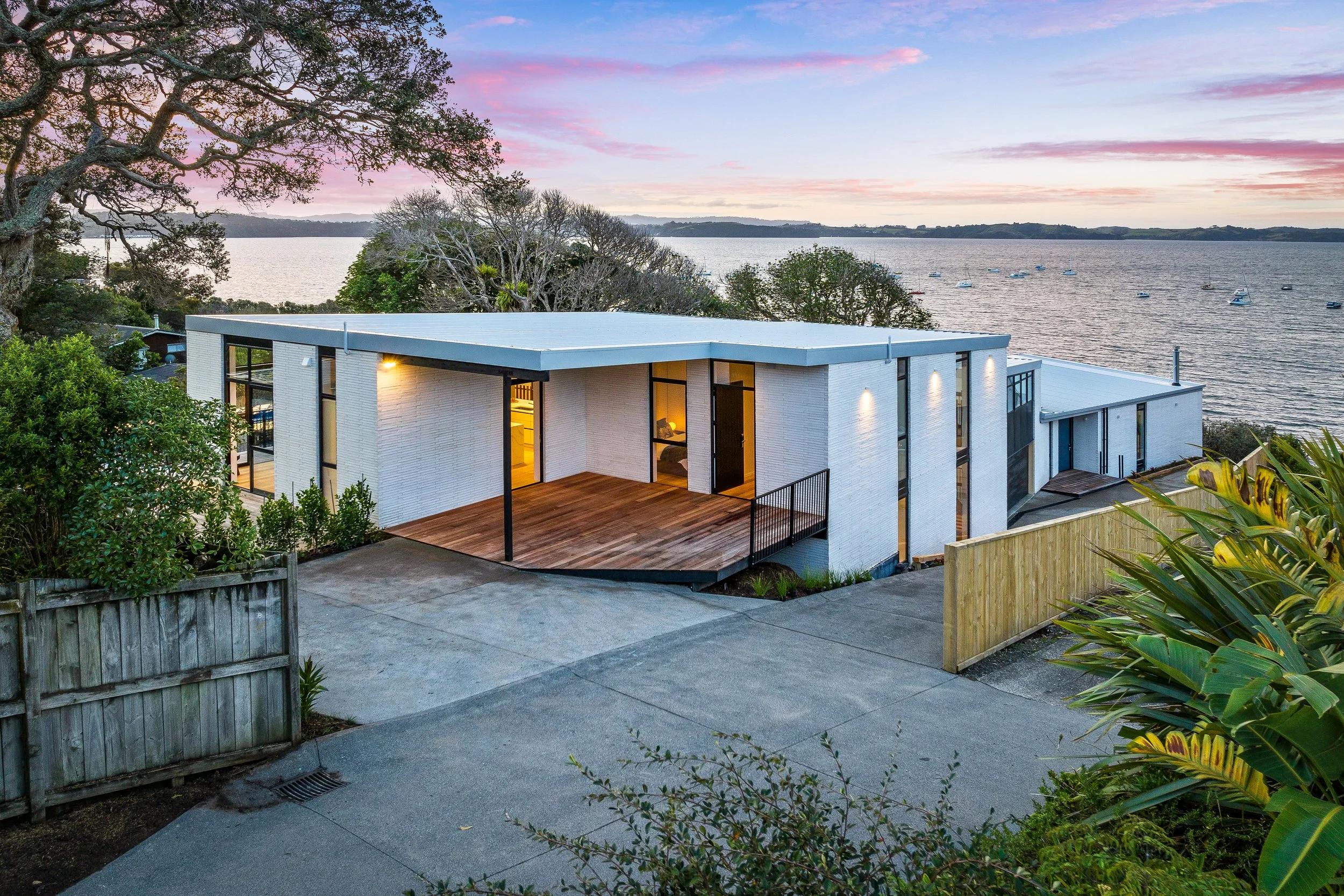 External shot of a modern house, new build which gravity plumbing did the plumbing for, overlooking the water