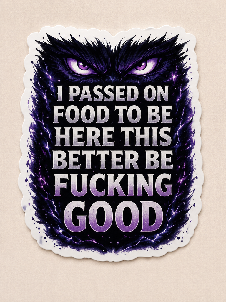 A sticker with an angry black panther face and purple eyes. The middle of the sticker has bold purple and gray text that reads: "I PASSED ON FOOD TO BE HERE THIS BETTER BE FUCKING GOOD."