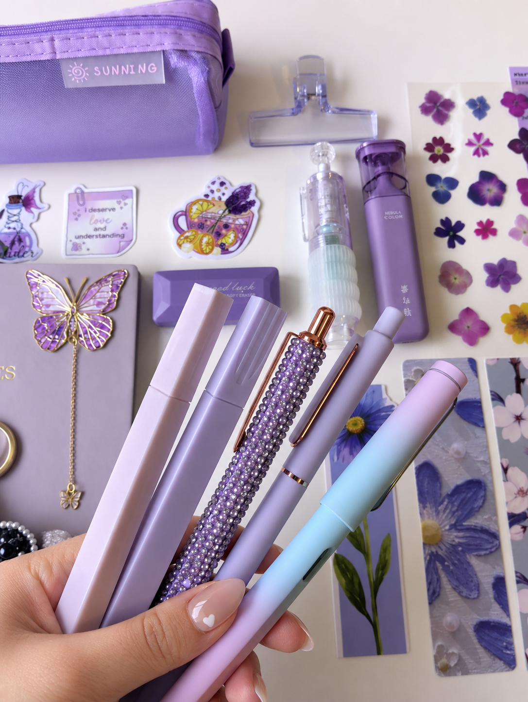 Signature_purple_pens.png
