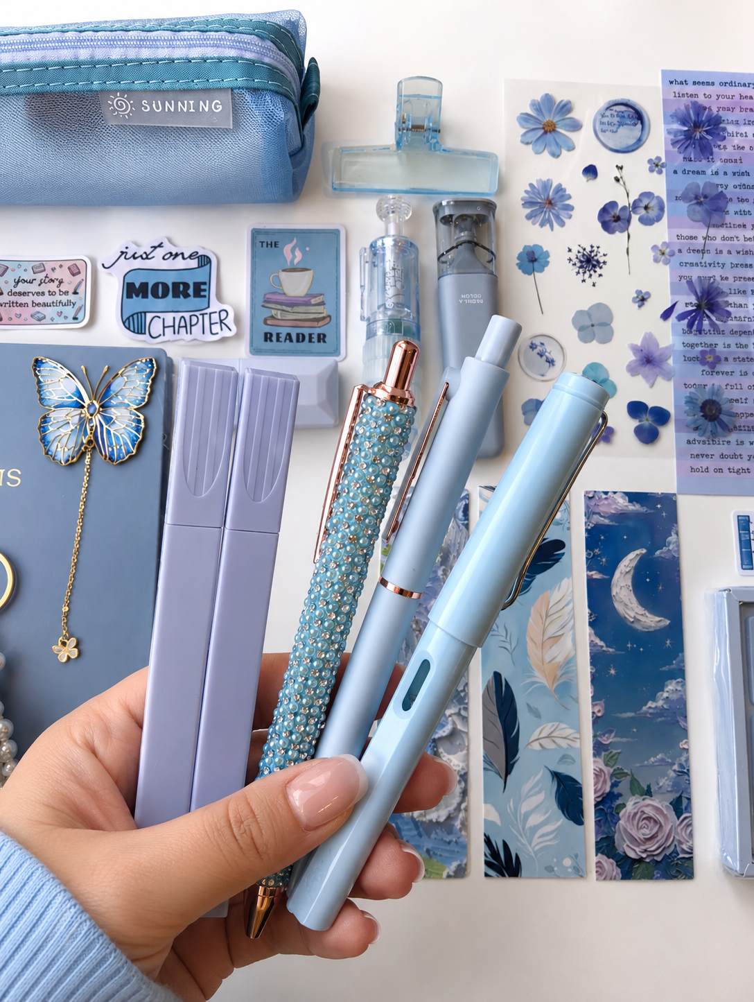 Signature_blue_pens.png