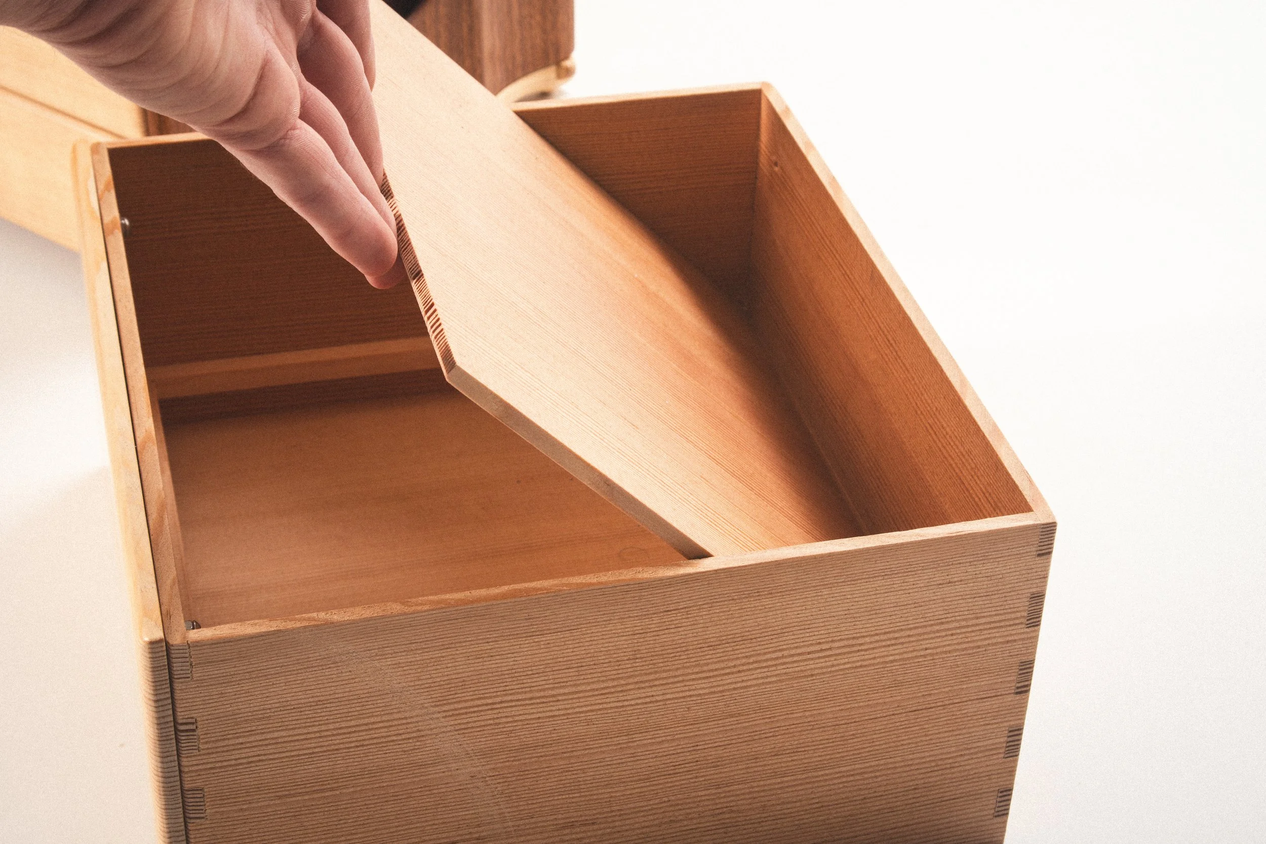 A false drawer bottom for private documents.