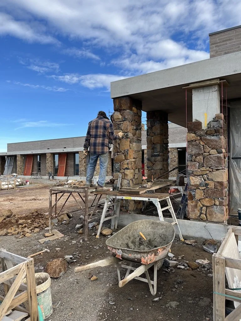 JT Stonewalls stonemasons constructing natural stone walling for building project in the Southern Highlands Bluestone cladding stone pillars