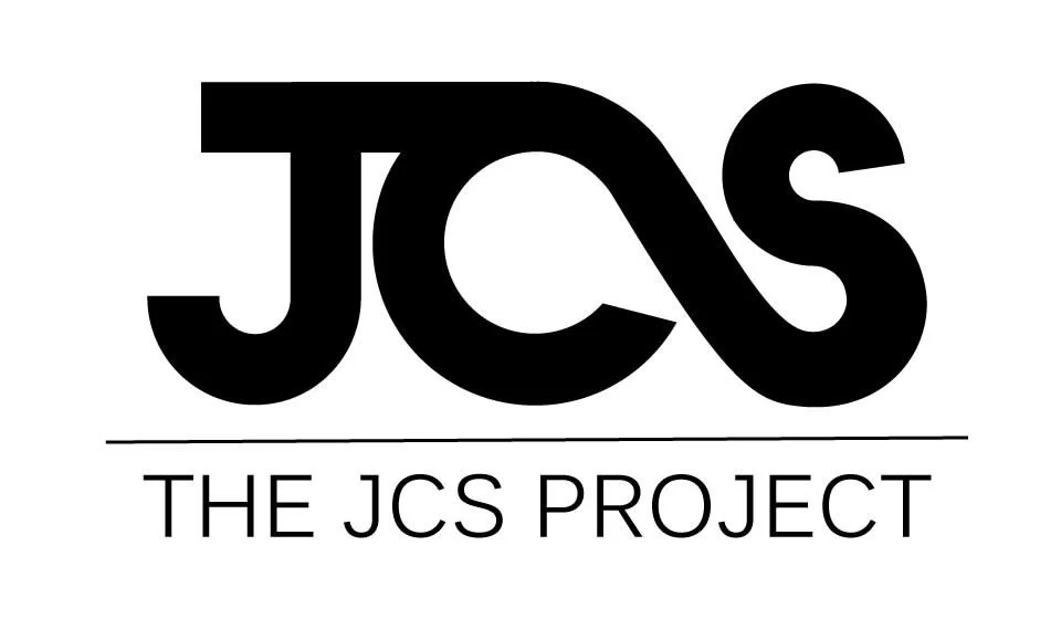 Logo of The JCS Project with bold black letters 'JCS' and the agency's name below.