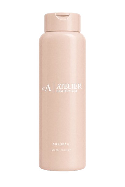 A light pink bottle of ATELIER Beauty Co. shampoo, 300ml.