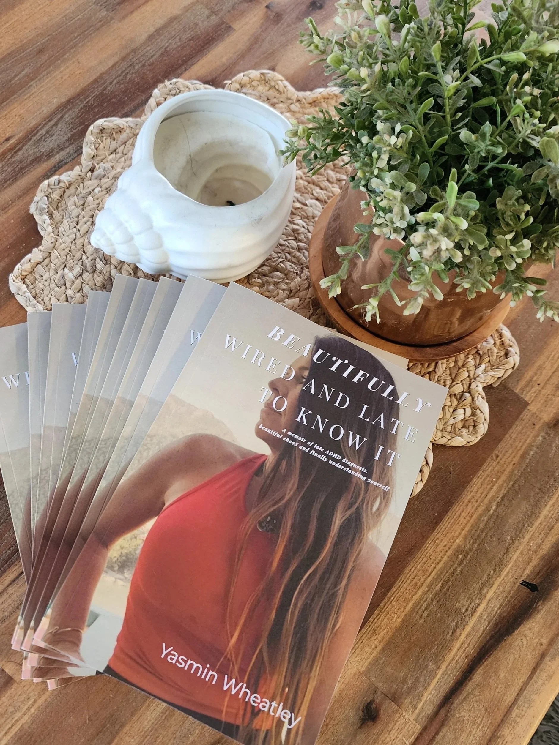 Copies of Beautifully Wired and Late to Know It by Yasmin Wheatley.