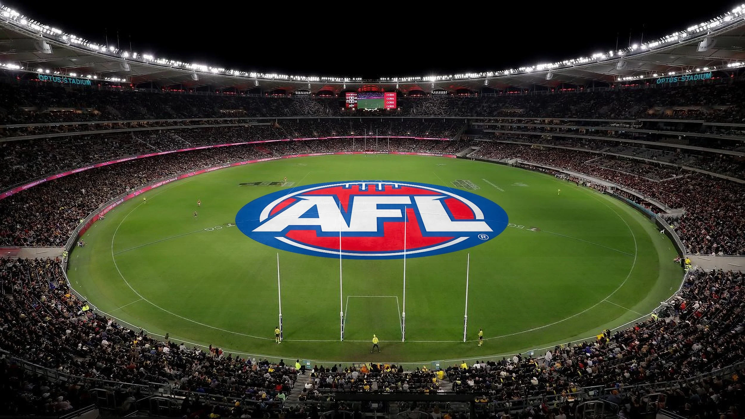 Nighttime view of a large stadium filled with spectators, with a green playing field featuring the AFL logo at the center.