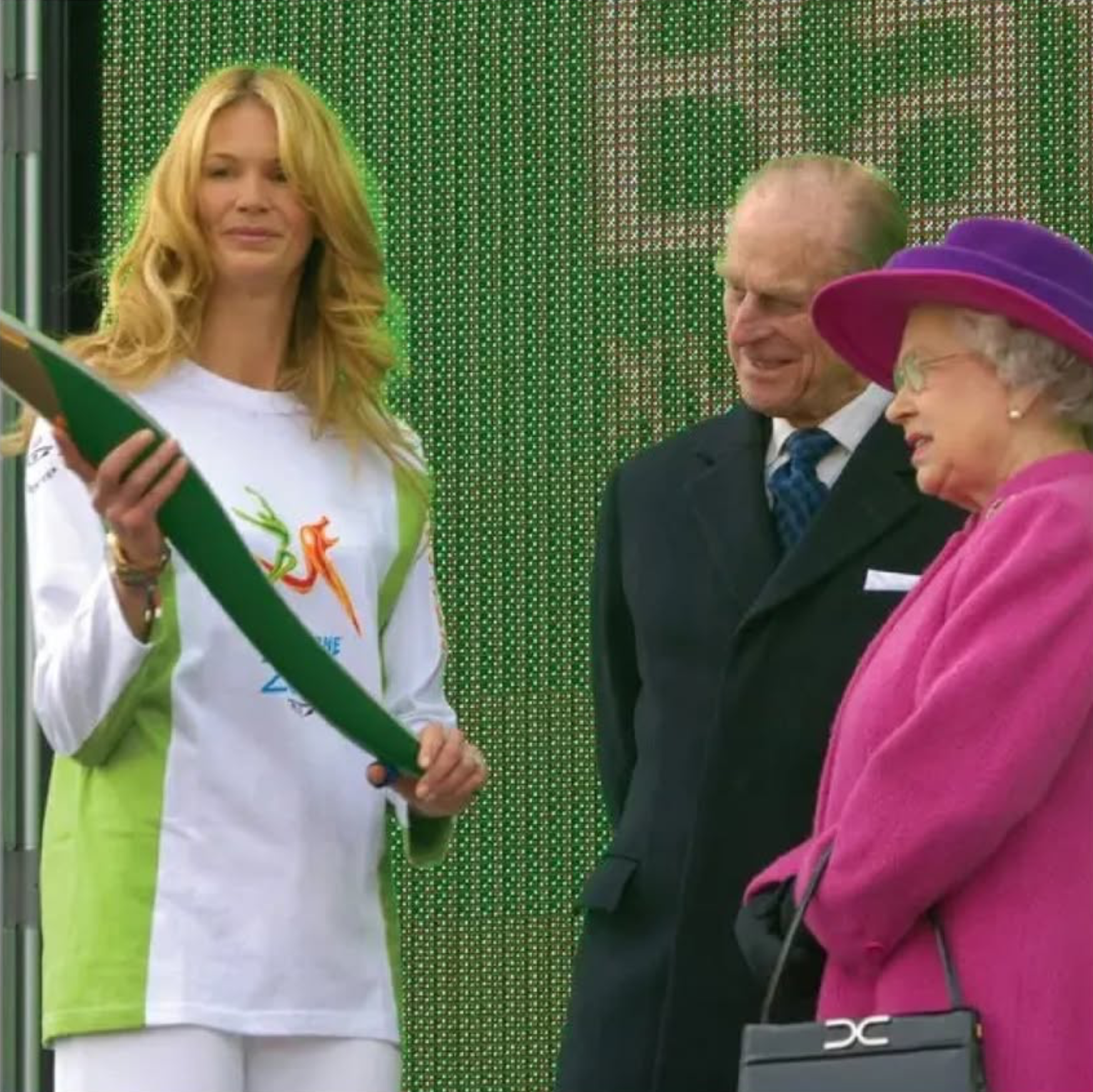  Queen Elizabeth and Prince Phillip at a public event.