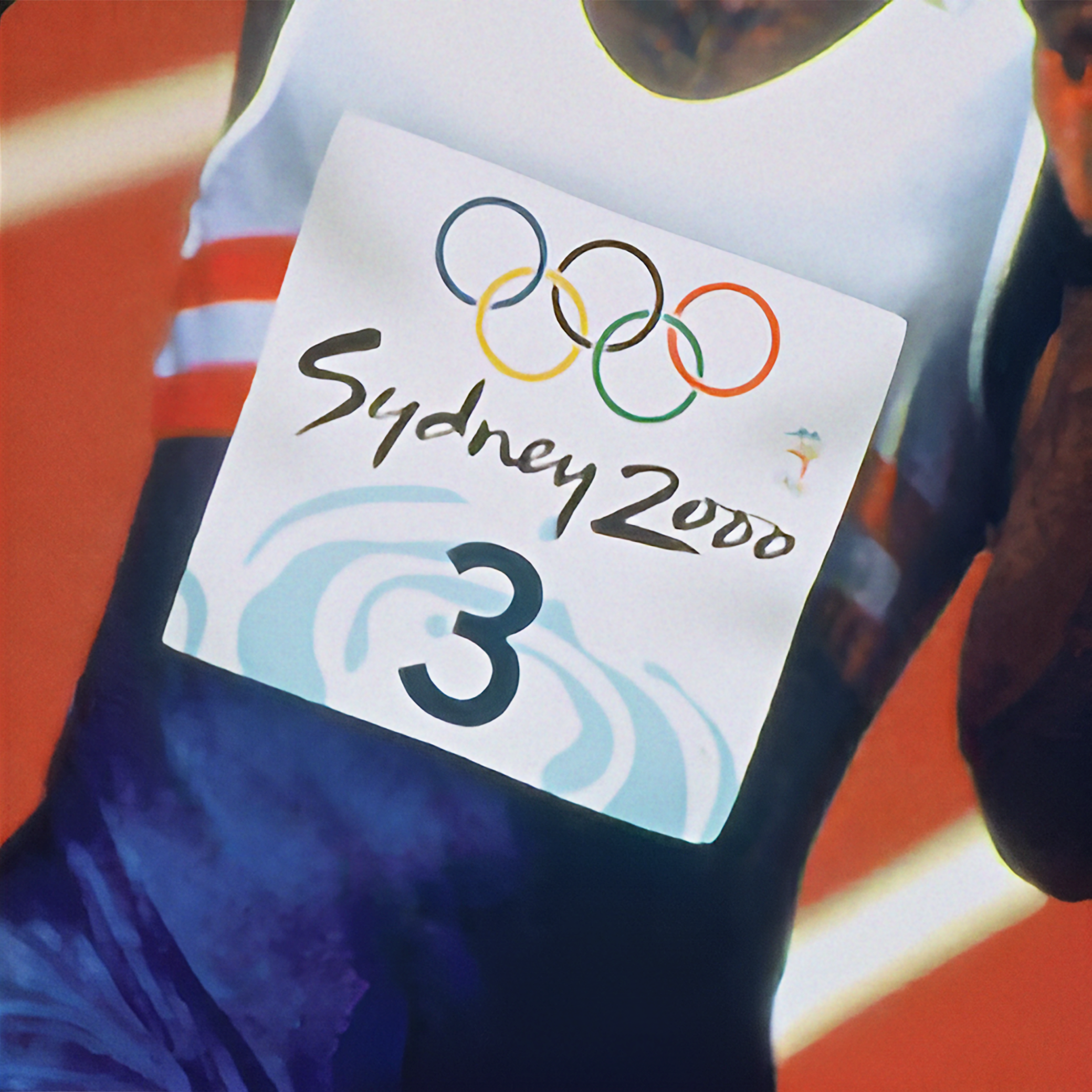Close-up image of a paper with the Olympic rings logo.