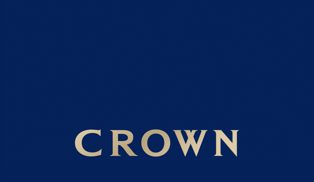 The image has a dark blue background with the word 'CROWN' written in large, bold, beige letters at the bottom center.