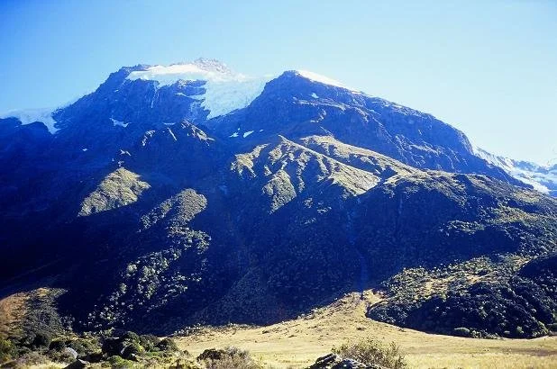  Mt Pollux from Top Forks Hut, the bivy site is a ledge just below the snow on the right 