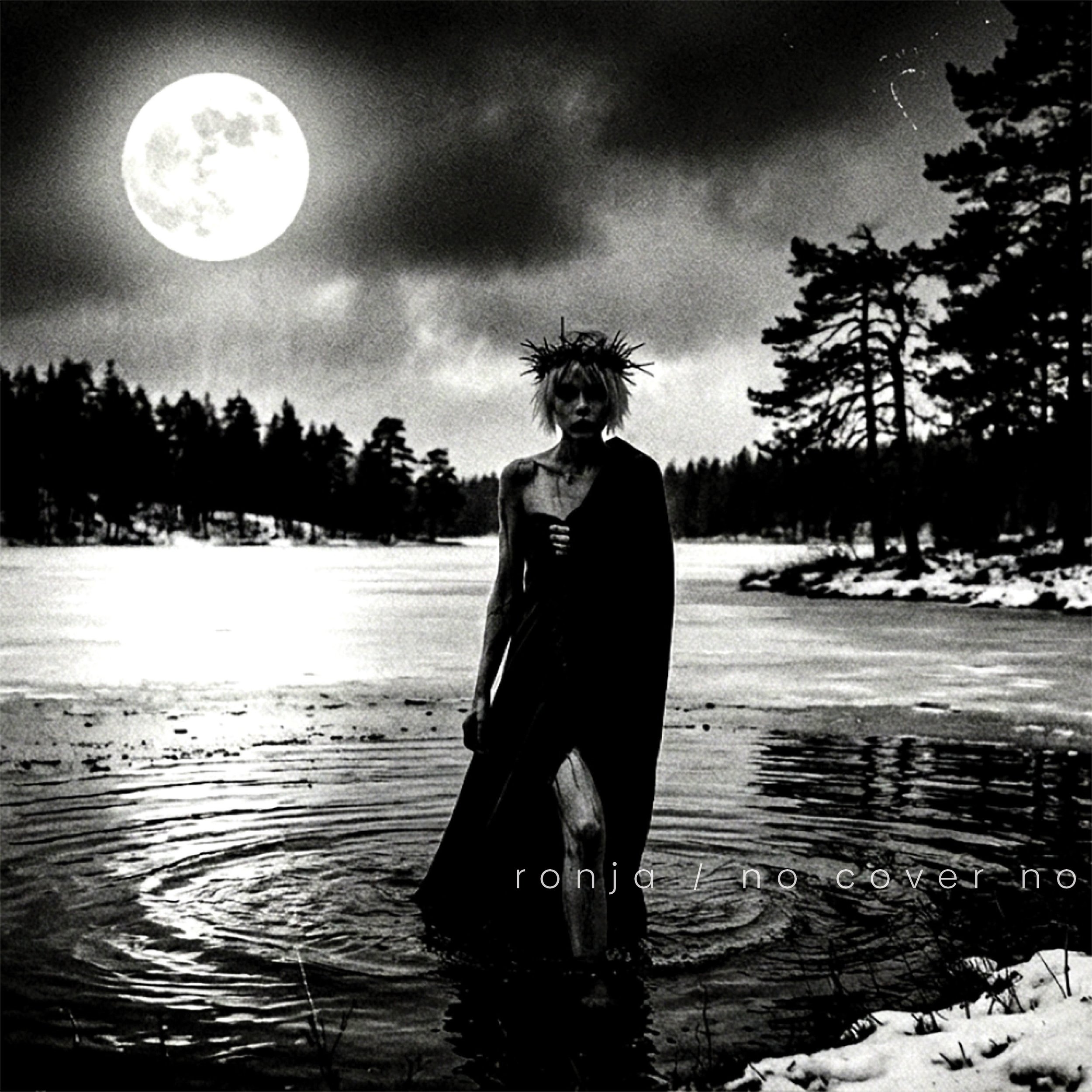 A black and white photo of a person with spiky hair standing in front of a body of water at night, with a large full moon in the sky and trees in the background.