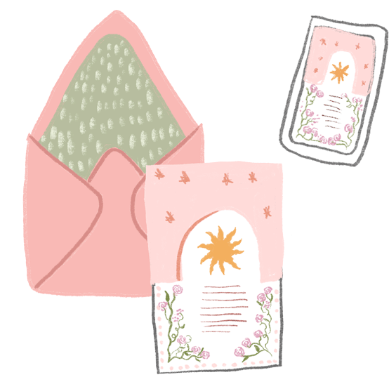 Pink envelope with floral interior, two greeting cards with floral designs and a gold star, on a pastel background.