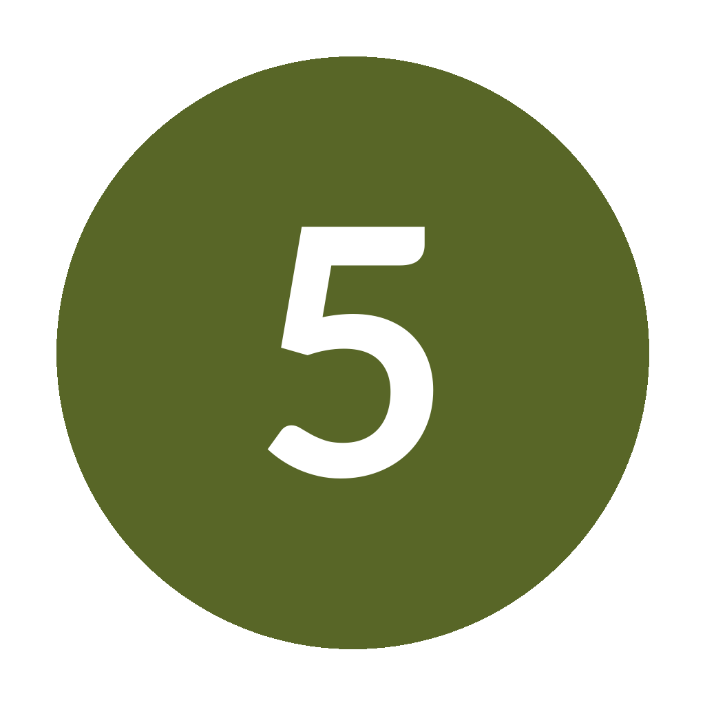 A green circular sign with the number 5 in white, likely indicating a route or distance marker.