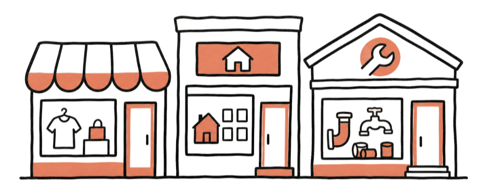Line drawing of three small shops with storefronts, an awning, and icons representing different businesses, including clothing, jewelry, a house, and tools.