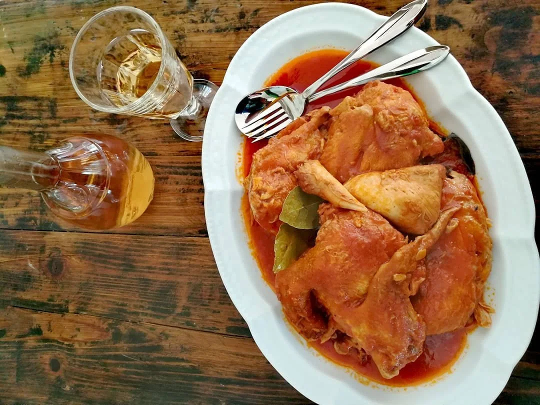 Country rooster in red wine sauce