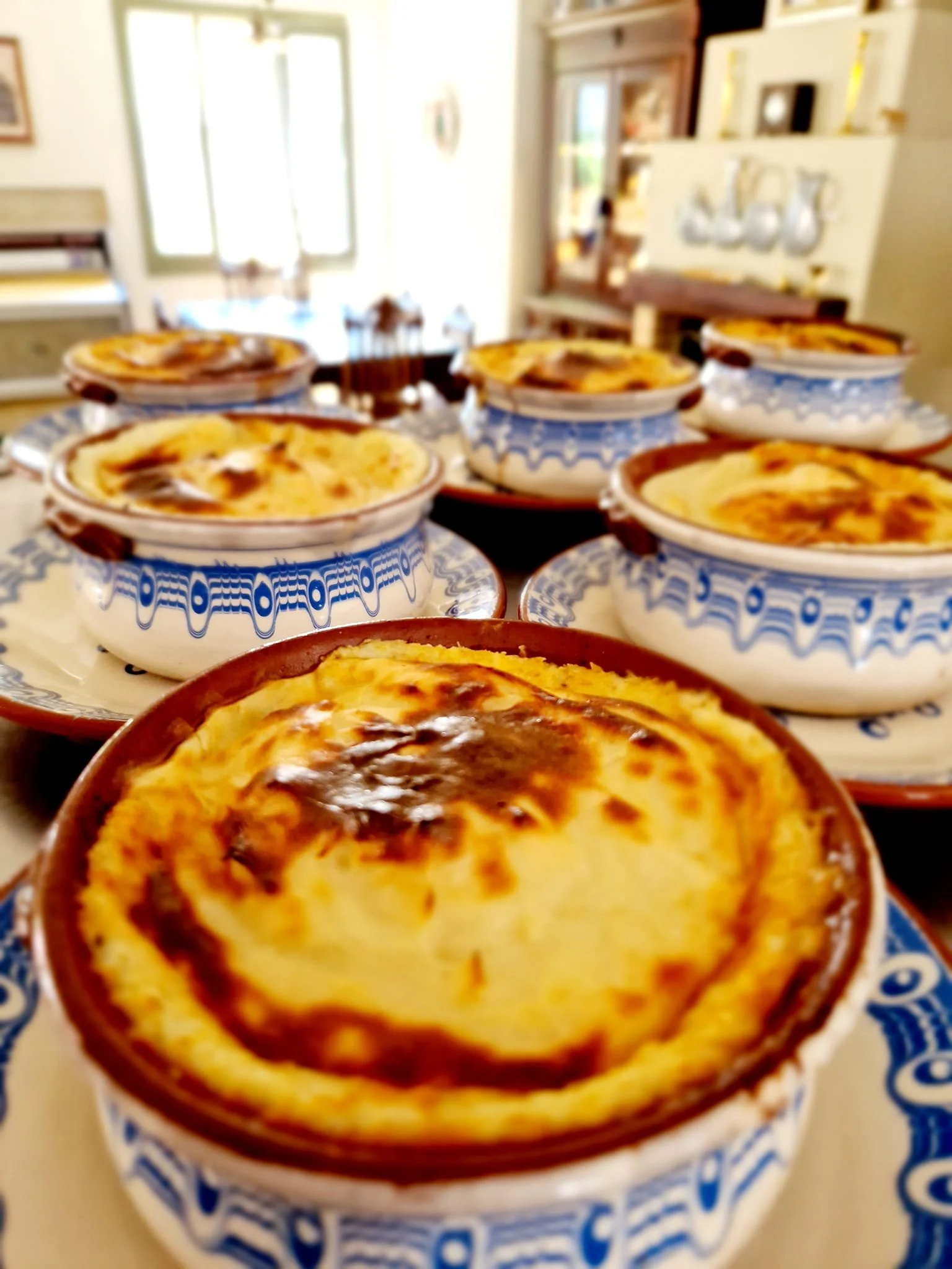 Moussaka
layers of eggplants, potatoes, minced meat, and creamy bechamel sauce topped with kefalotyri cheese.