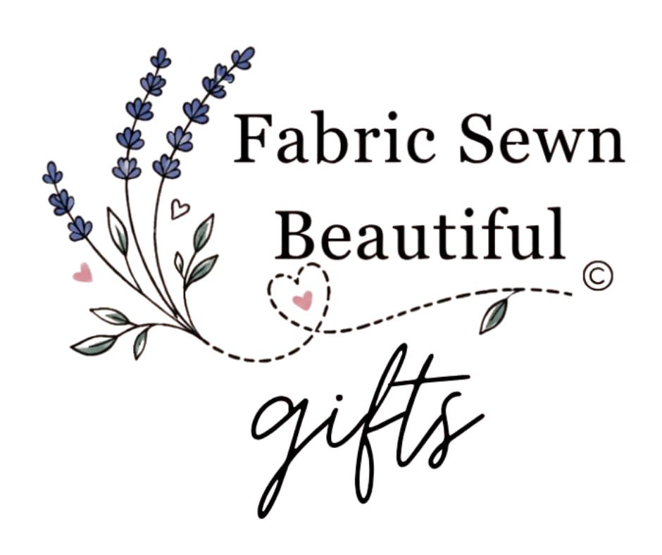 Decorative text reading "Fabric Sewn Beautiful Gifts" with lavender flowers and green leaves surrounding it.