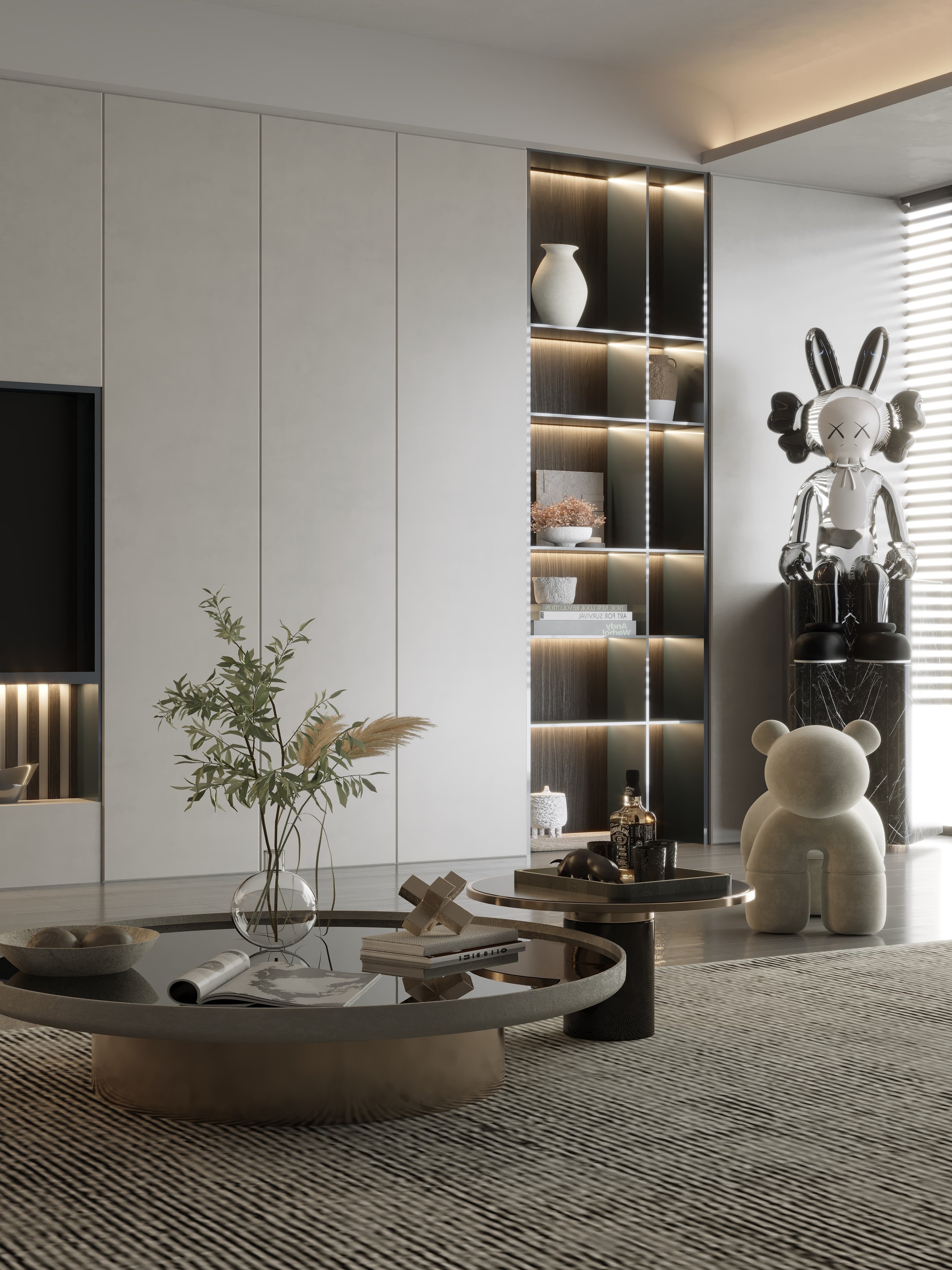 Modern living room with a white wall, glass display shelf with vases, a sculpture resembling a bunny, a round coffee table with decor, a plant in a clear vase, and a patterned rug.