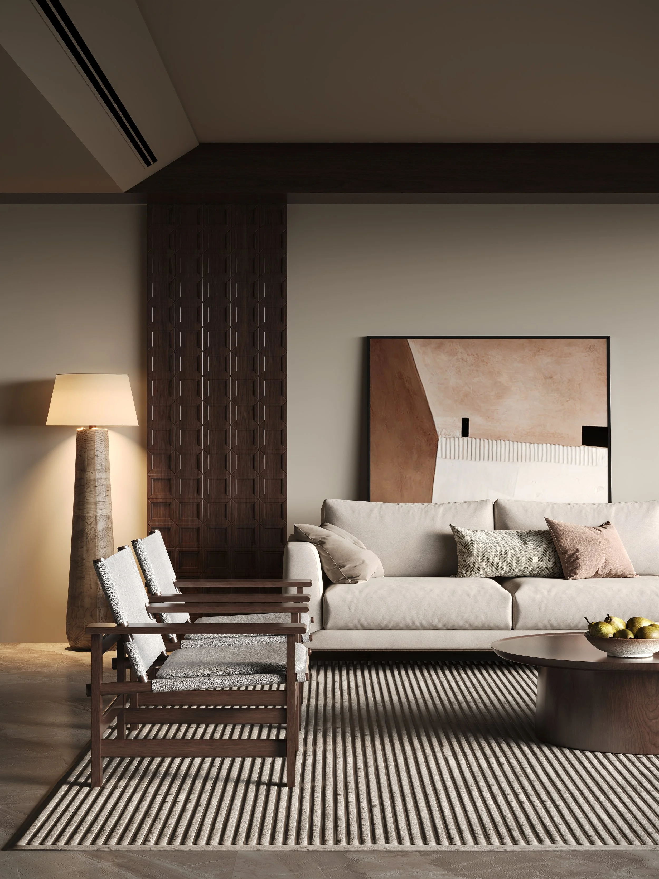Modern living room with a beige sofa, patterned pillows, and a large abstract painting on the wall. A tall floor lamp is beside a wooden panel, and a round coffee table with pears sits on a striped rug.
