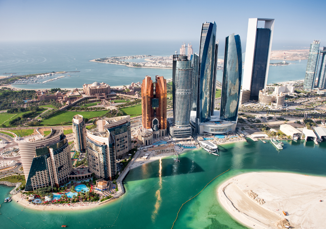 Aerial view of modern skyscrapers, waterfront, and beach in Dubai Marina, Dubai, United Arab Emirates.