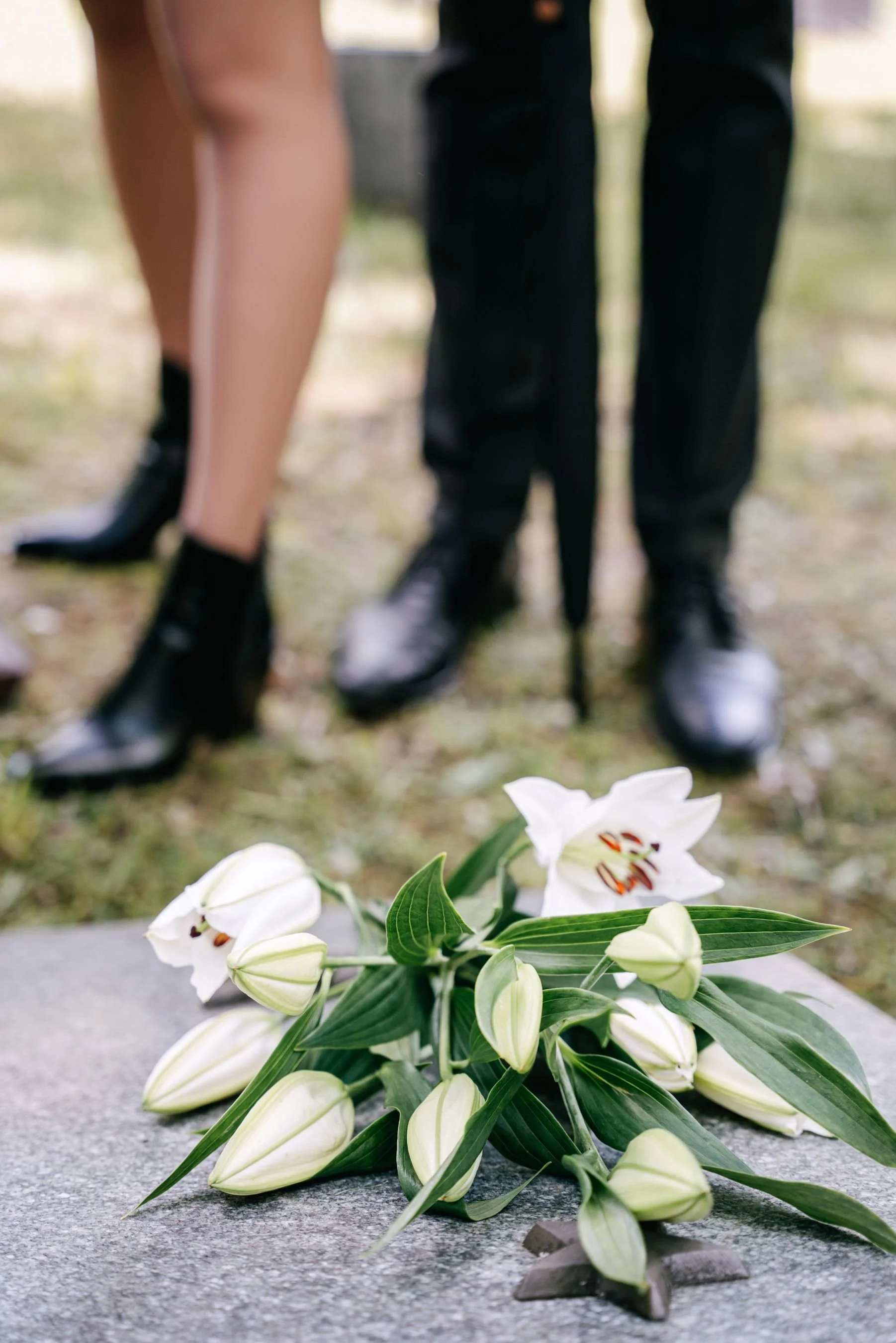 Flowers laid on a coffin at a funeral