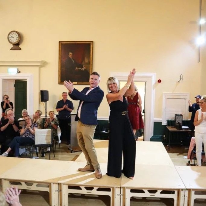 Christian Lockyer hosting an event, pictured with organiser Juliet Matthews