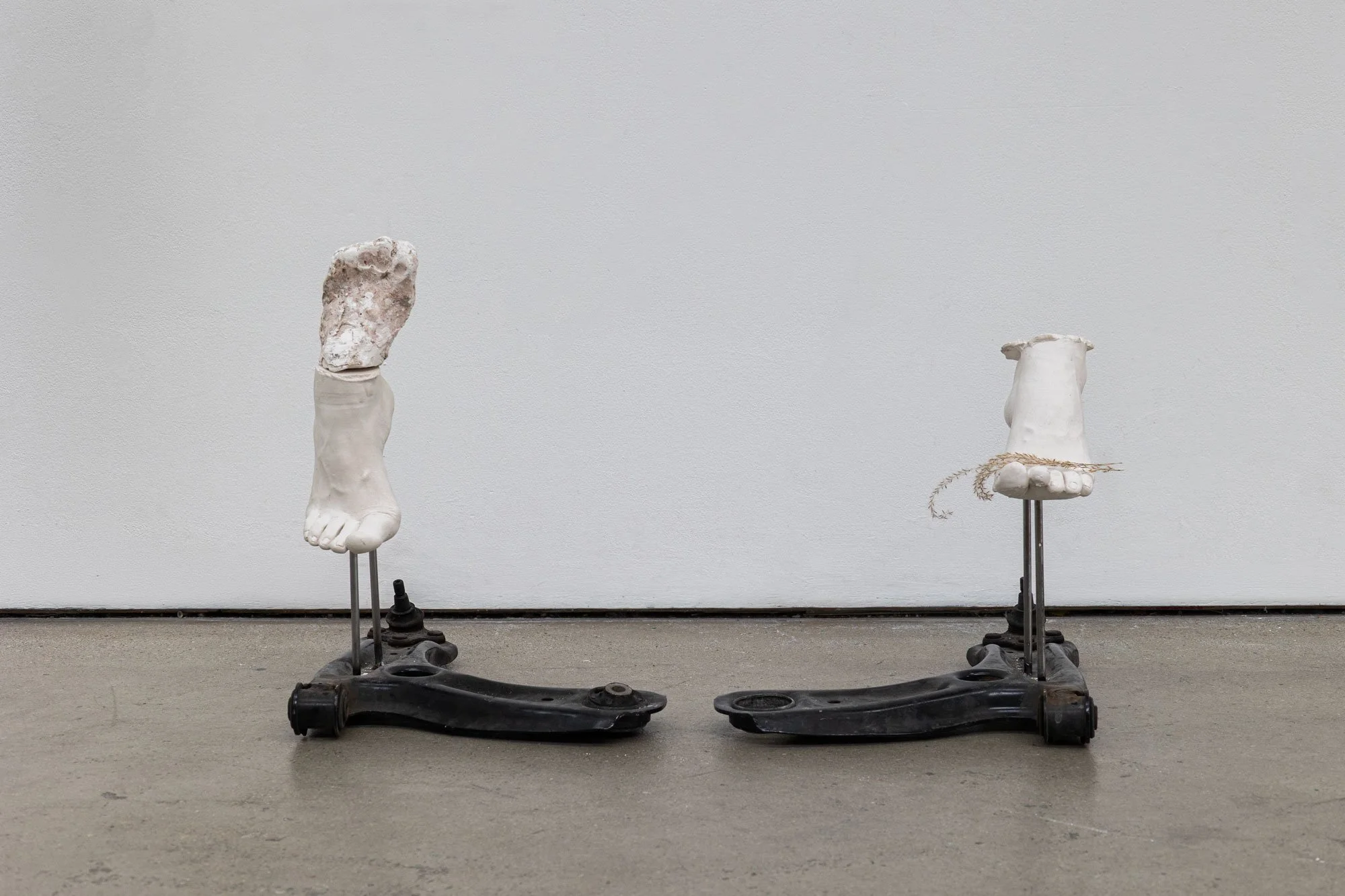 'That Which We Use To Move Through and Over' (2026) | Car suspension arms, silicone, steel, dried plants | 86 x 32 x 36cm