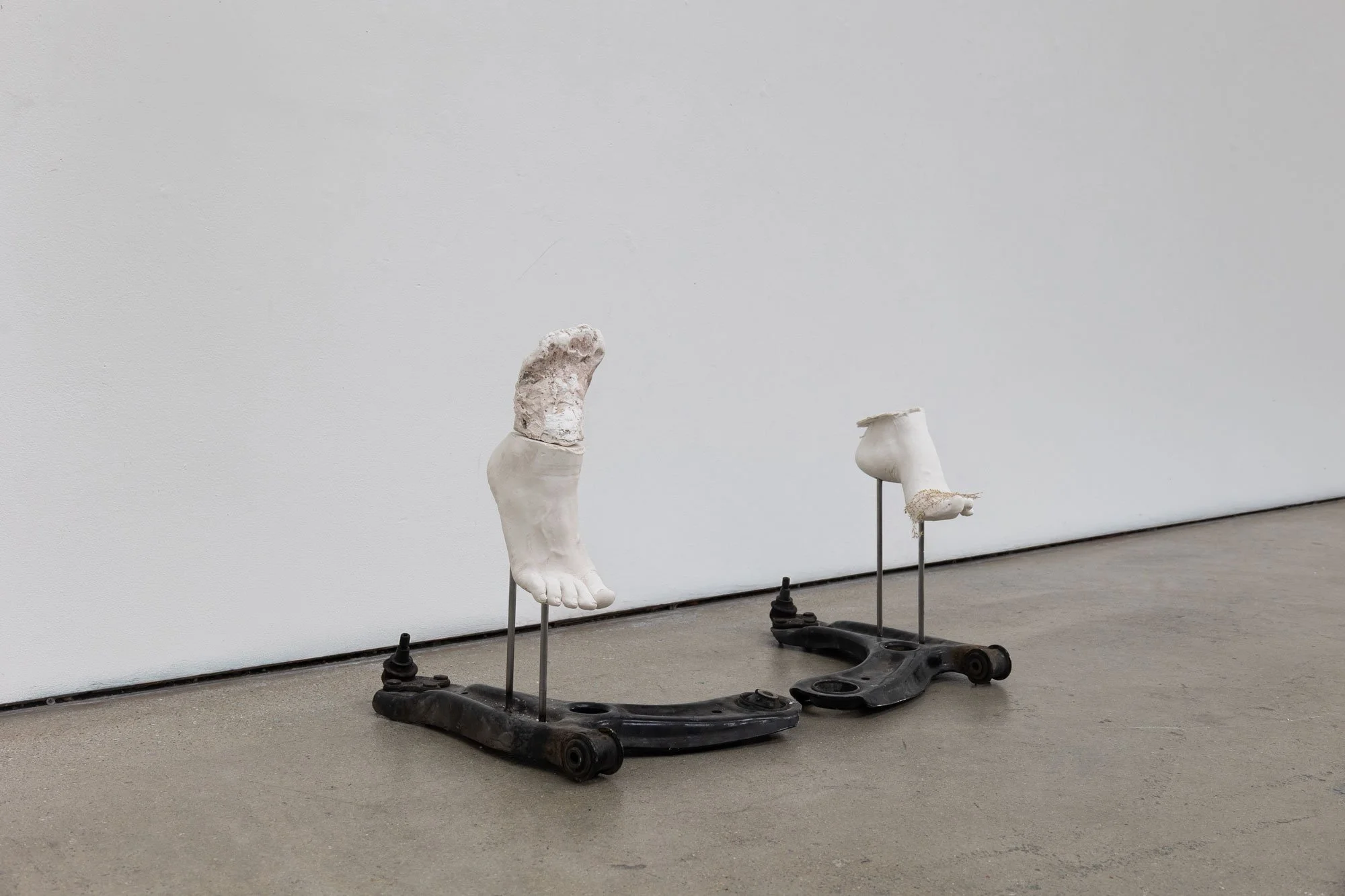'That Which We Use To Move Through and Over' (2026) | Car suspension arms, silicone, steel, dried plants | 86 x 32 x 36cm