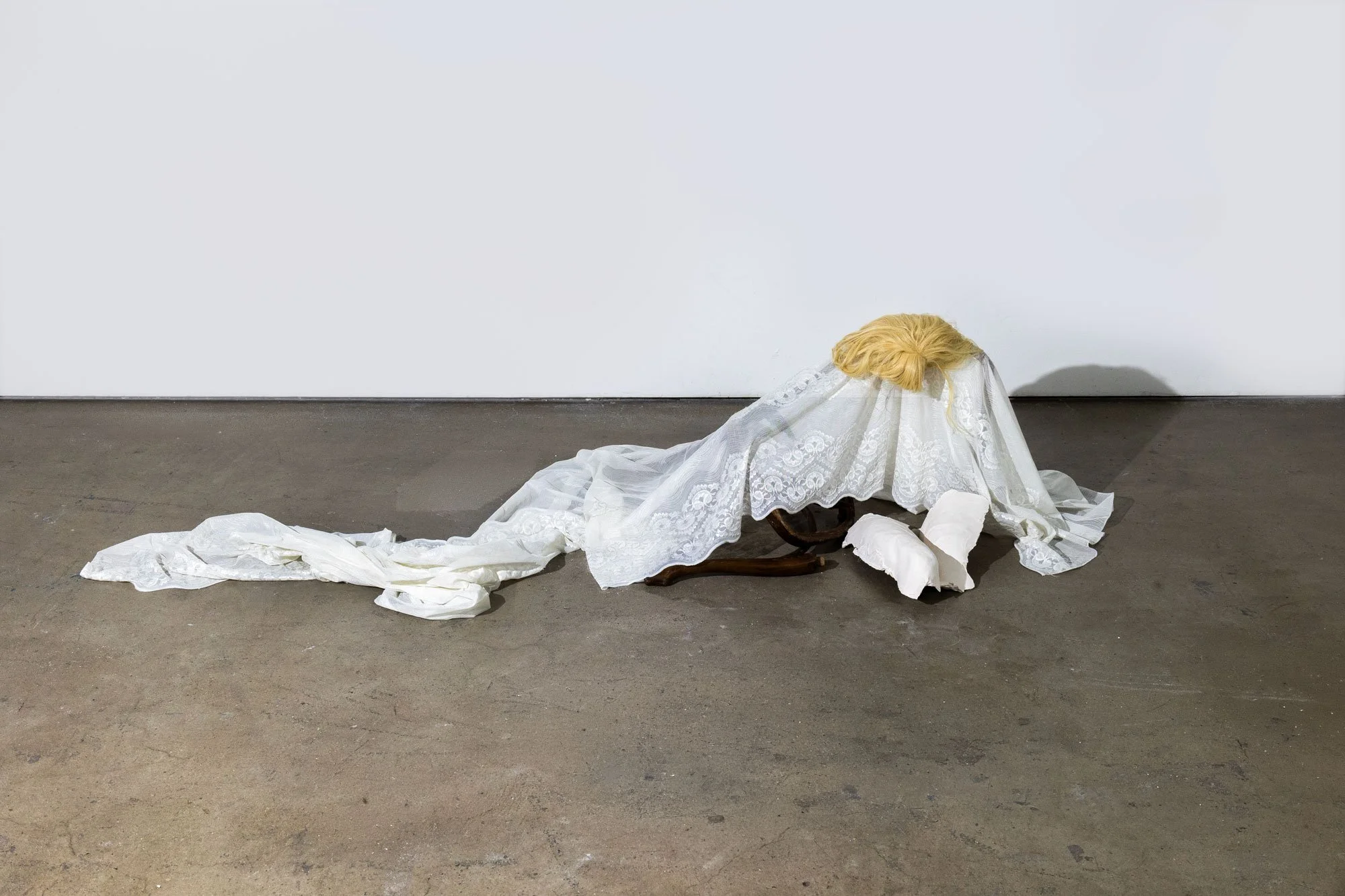 'Good Wife' (2026) | Wig, broken chair, white lace, lighting | 262 x 62 x 65cm