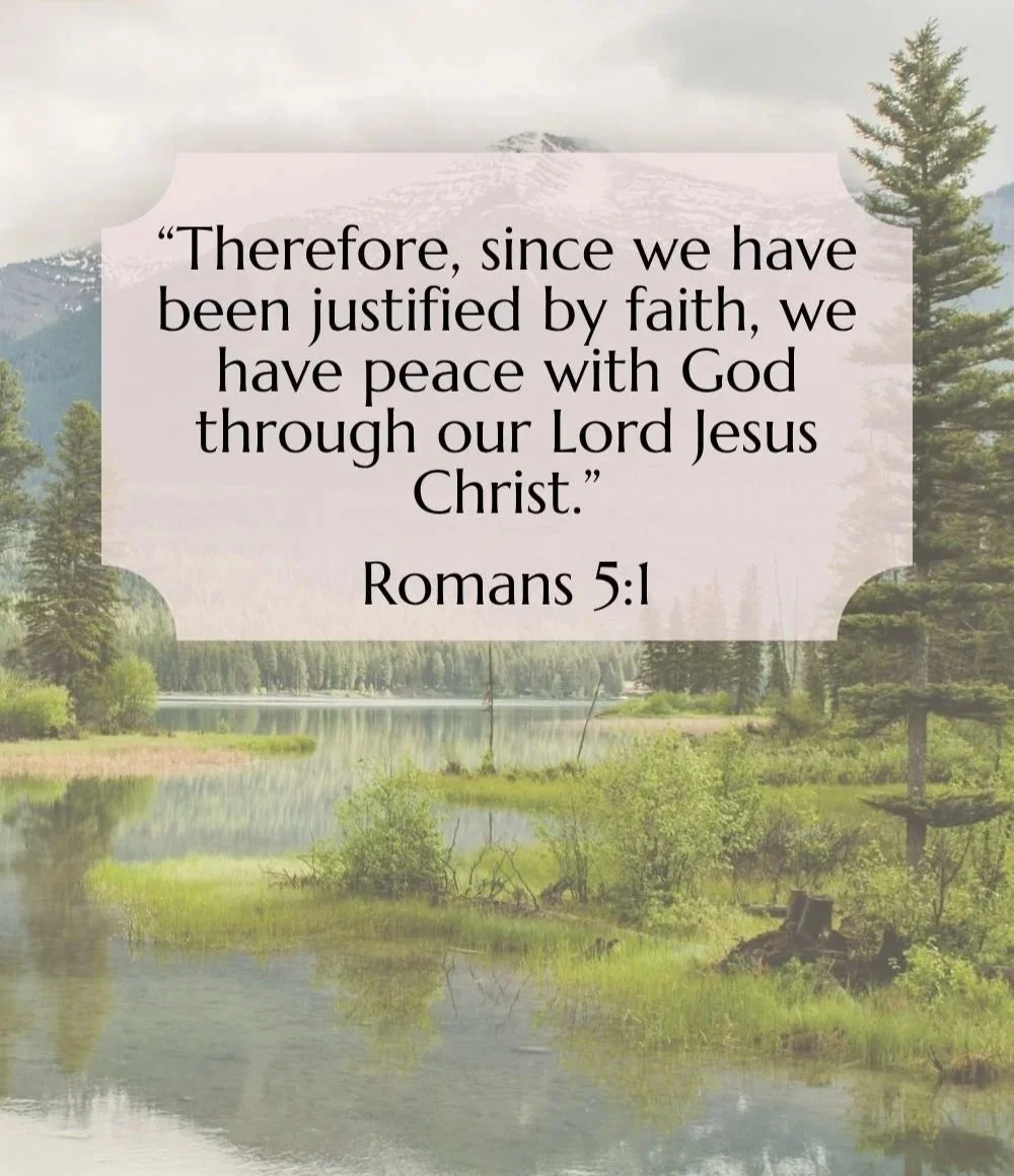 A scenic landscape with a lake, trees, and mountains in the background, overlaid with a Bible verse from Romans 5:1 about faith and peace with God.