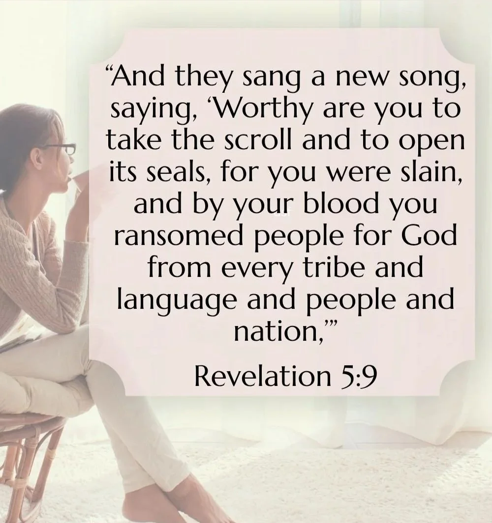 A woman sitting on a chair, looking at a large screen displaying a biblical quote from Revelation 5:9.