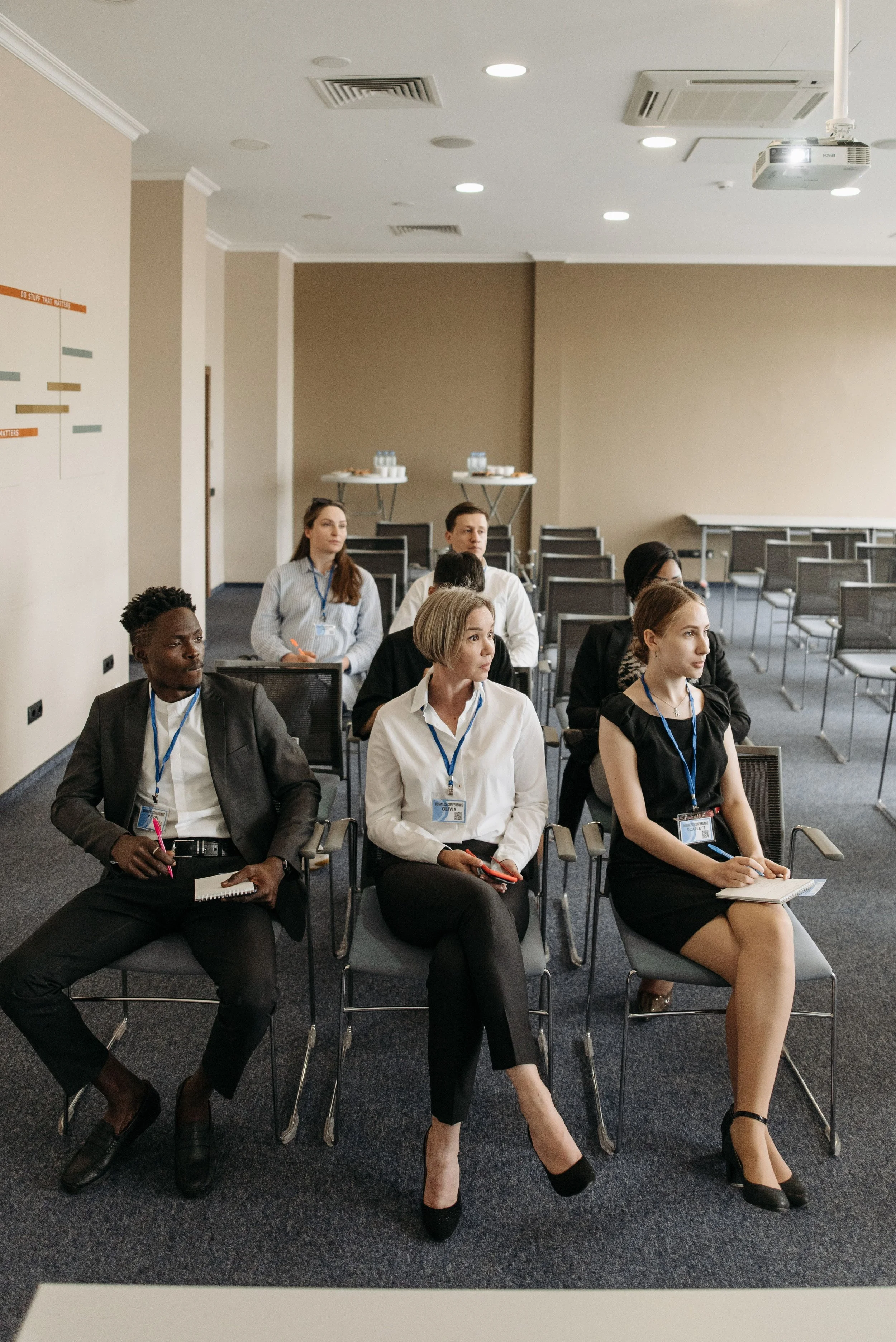People at a corporate event with coordinated corporate merchandising