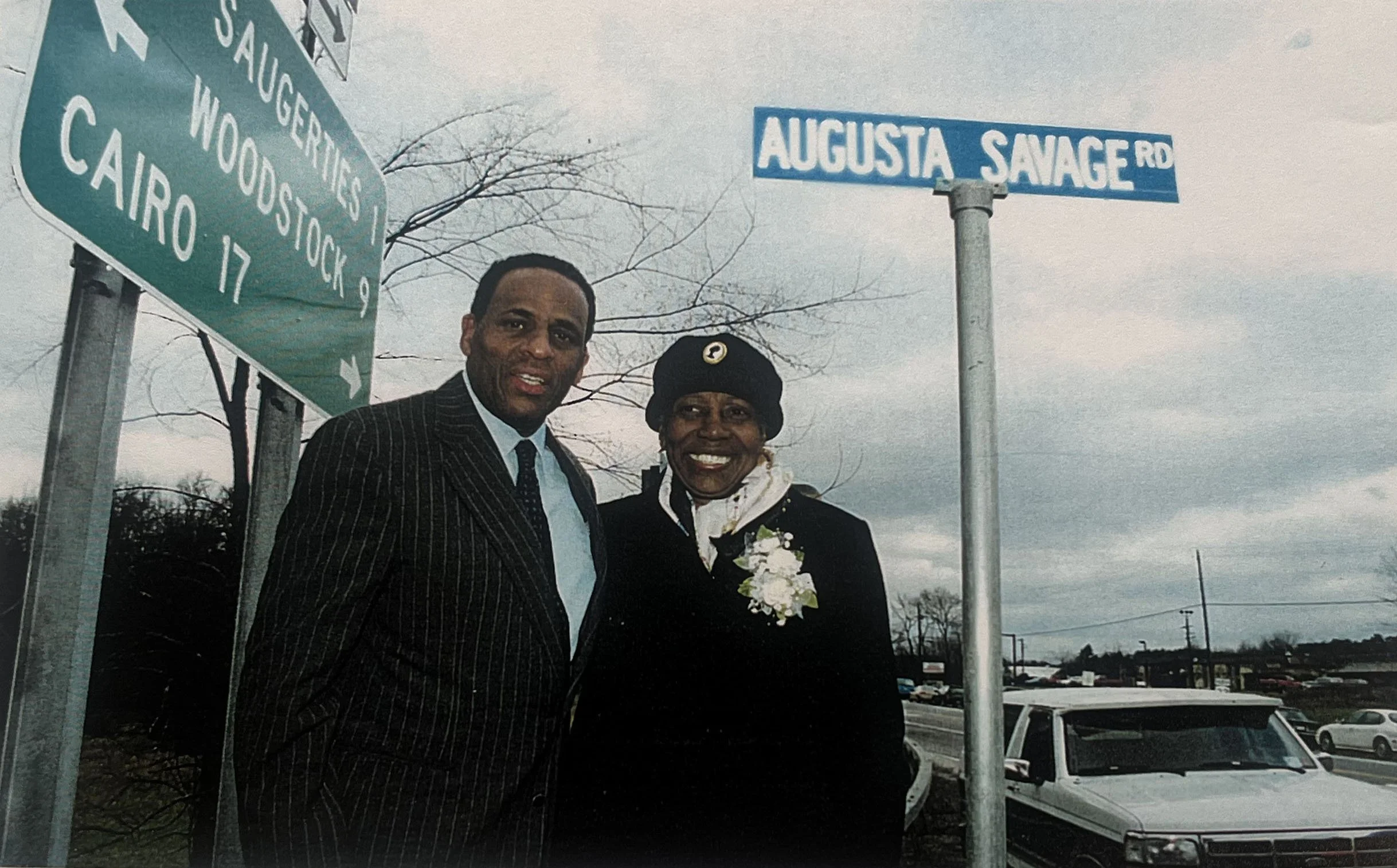 H. Carl McCall, New York State Comptroller, and Lorraine Lucas, Savage’s step-granddaughter, at the dedication of Augusta Savage Road, April 5, 2000. Lucas donated most of the artwork Savage left to the Schomburg Center for Research in Black Culture.