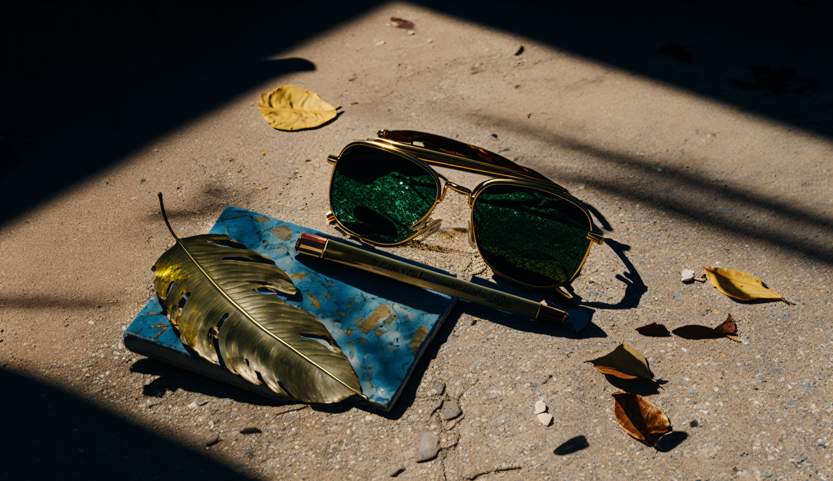 JojoFrank_Oliver_Peoples_sunglasses_lying_on_concrete_cigarette_bf7d36b1-756c-4655-9362-65a950821d86.png