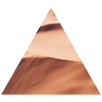 Sand dunes in a desert landscape with a triangular crop effect.