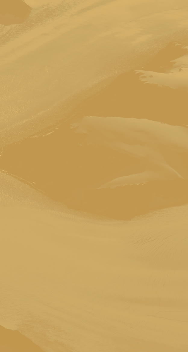 Close-up of a face with smooth skin and closed eyes, partially covered in a golden-colored substance or fabric.