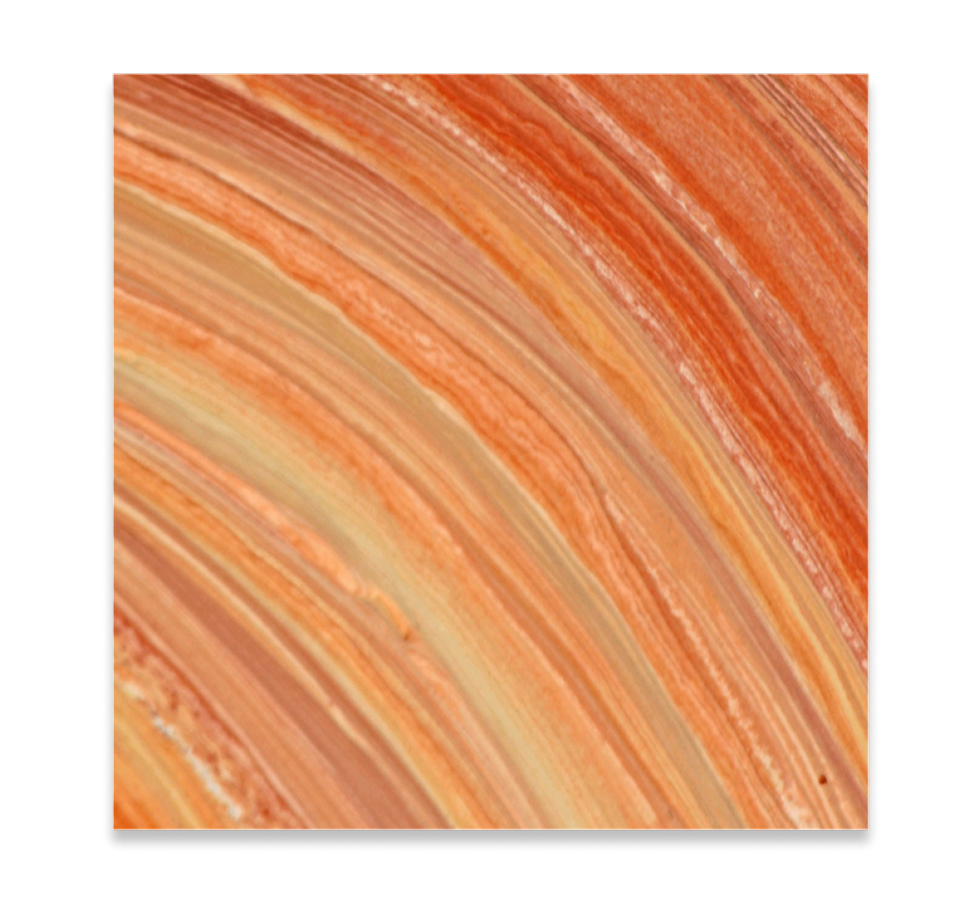 Close-up of a polished, layered orange and beige marble stone with curved striations.