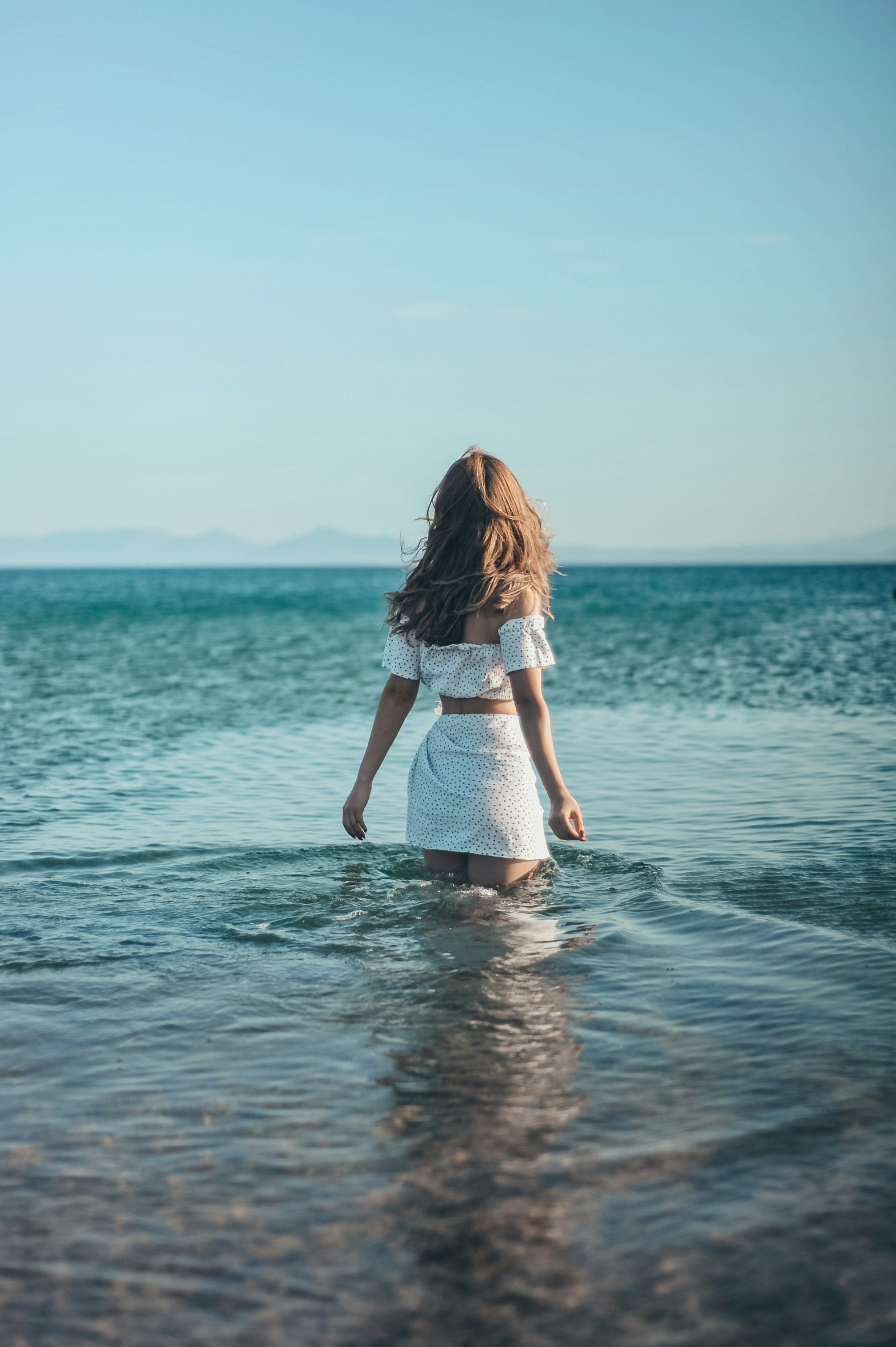 Stop Summer Swims From Wrecking Your Hair