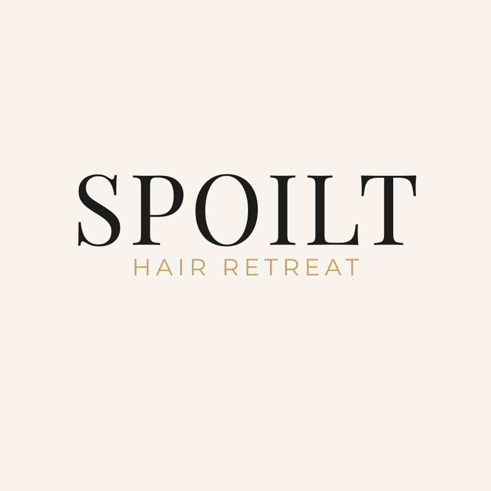 Spoilt Hair Retreat logo with black and gold text on a light background.