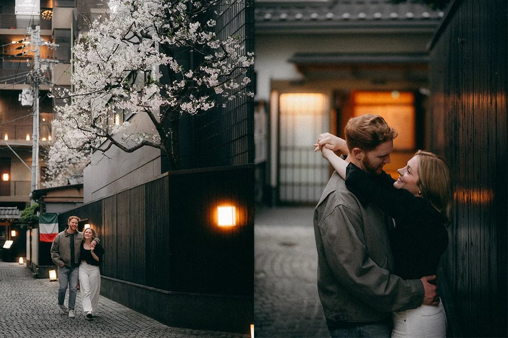 A couple walking on a cobblestone street with blooming cherry blossom trees and lights, and then a separate photo of the couple dancing closely and smiling in an alleyway with dark walls.